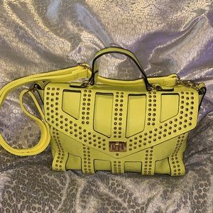 Fashion-Trendy, statement bag. Citron color with studs.
